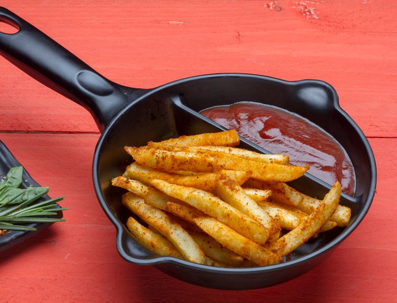 Seasoned waffle fries with dipping sauce